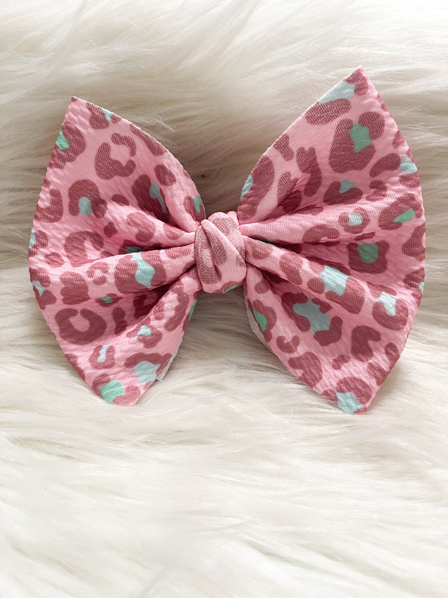 Pink cheetah bow/ Piggies