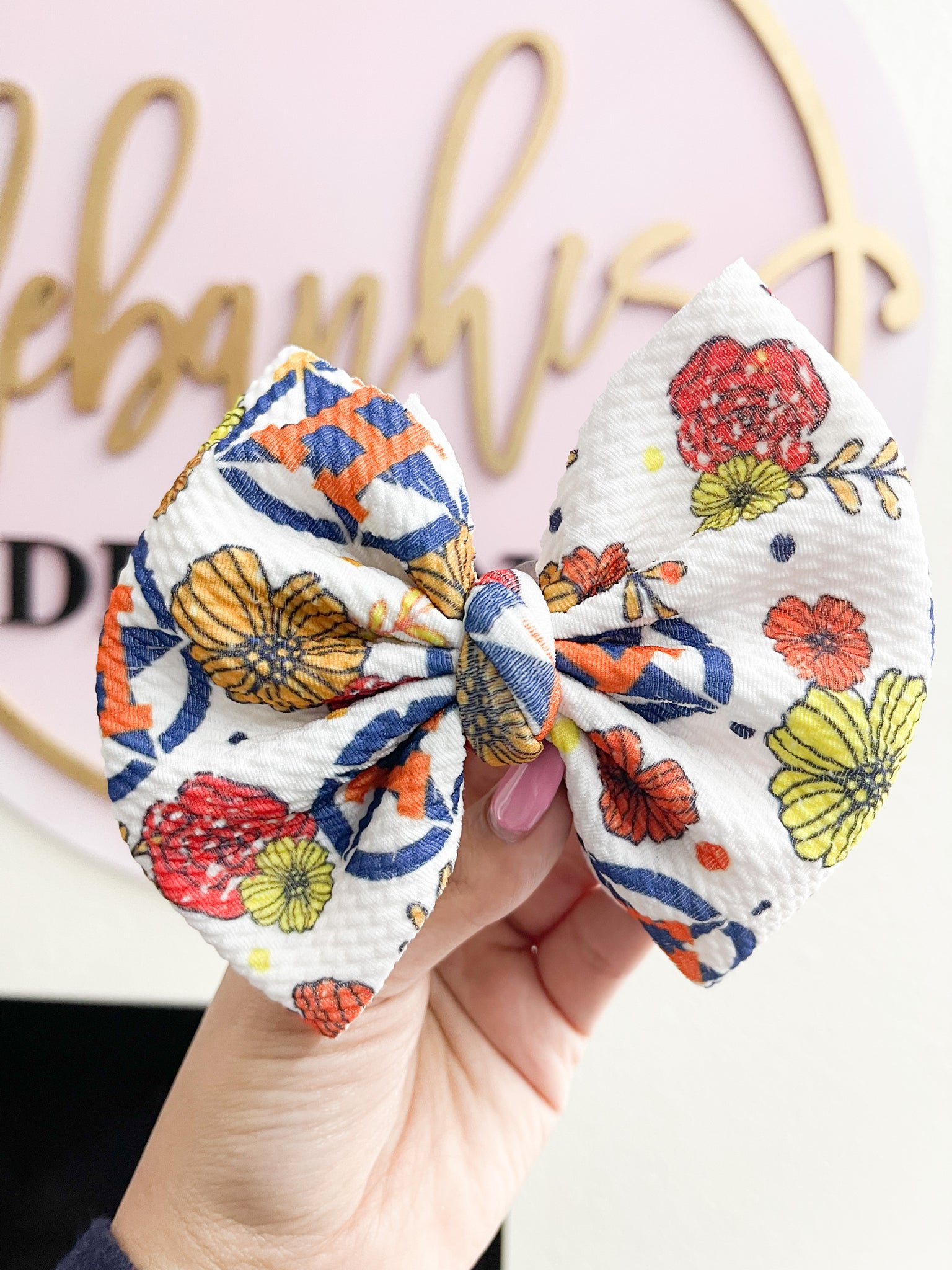 Floral Astros bow/ Piggies